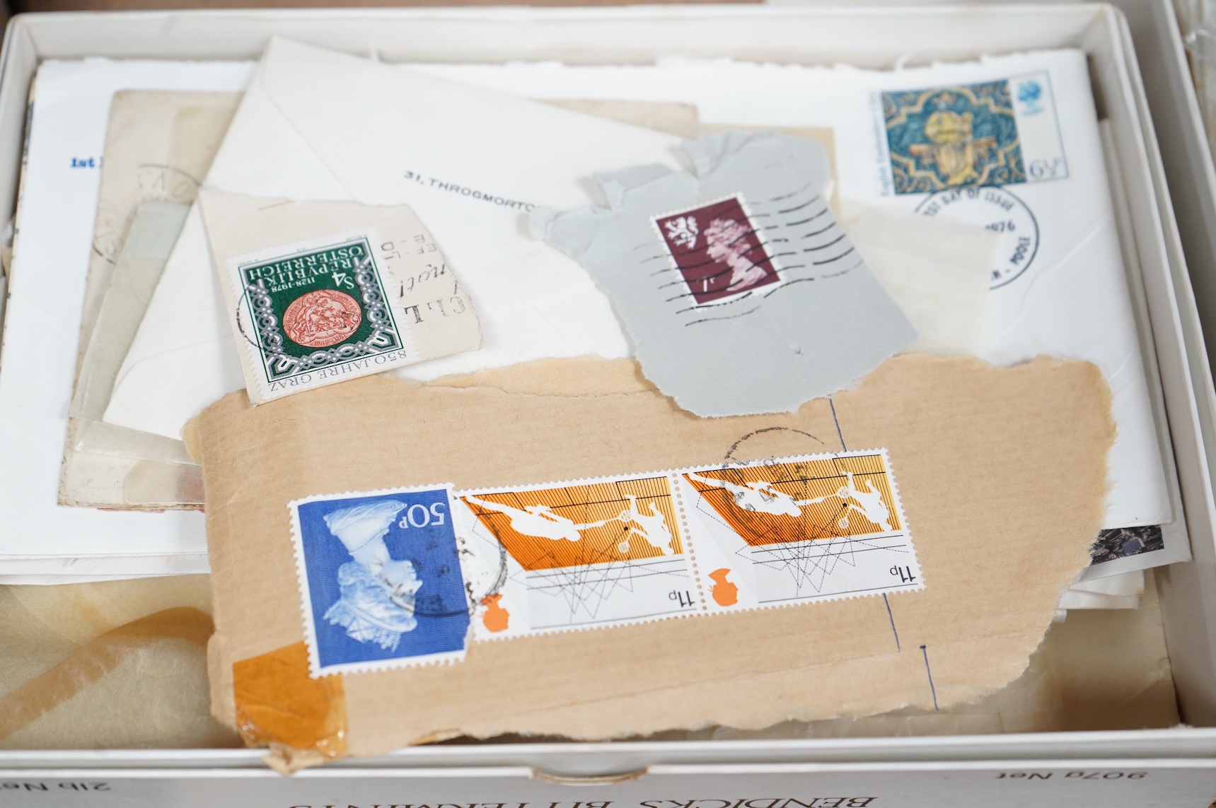 A collection of sundry items to include a scrapbook and a large collection of various stamps